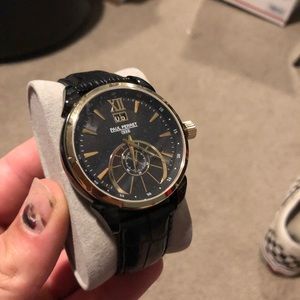 Paul Perret black and gold